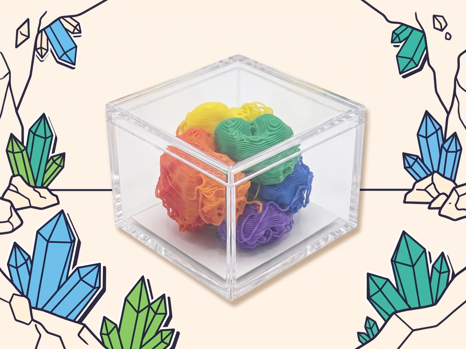 A clear acrylic cube holding a rainbow tangle of printer purge blobs